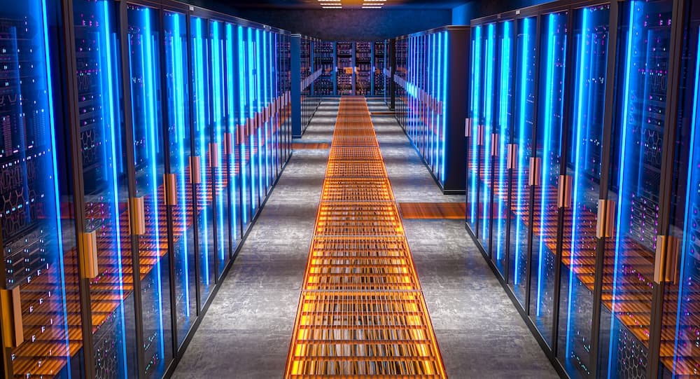 Data center racks under a blue light